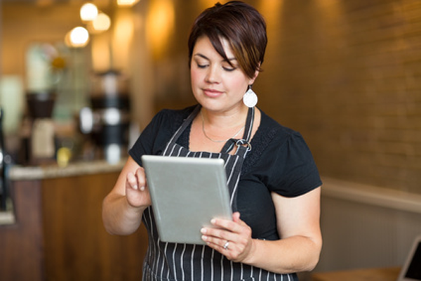 waitress taking order on tablet